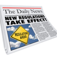 newspaper reads new regulations
