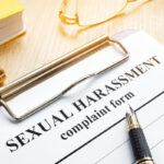 Sexual harassment complaint form on a desk. Sexual harassment complaint form on a desk.