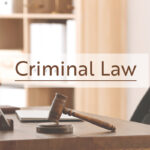 Table with judge gavel and caption criminal law Table with judge gavel and caption criminal law